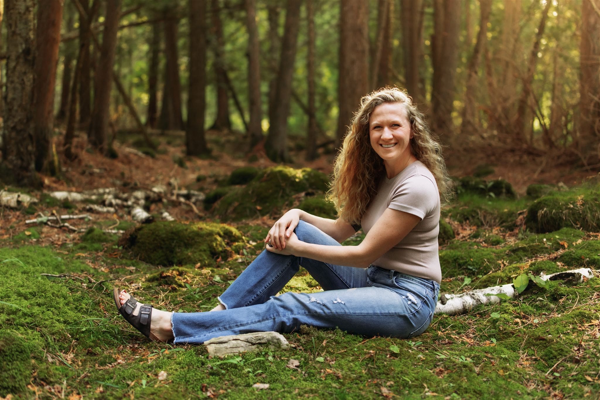 Erica, the photographer, in the woods
