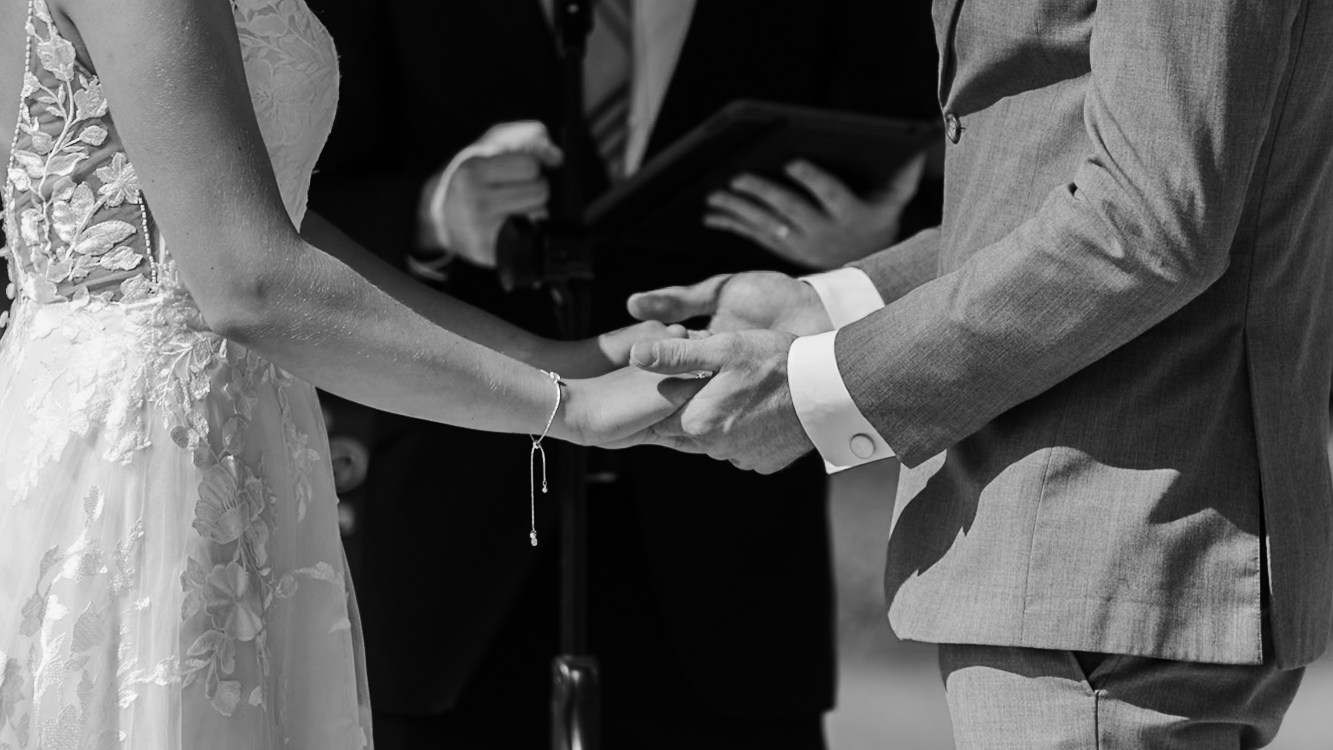 Kelsey & Michael Green Bay Wedding Photo Holding Hands