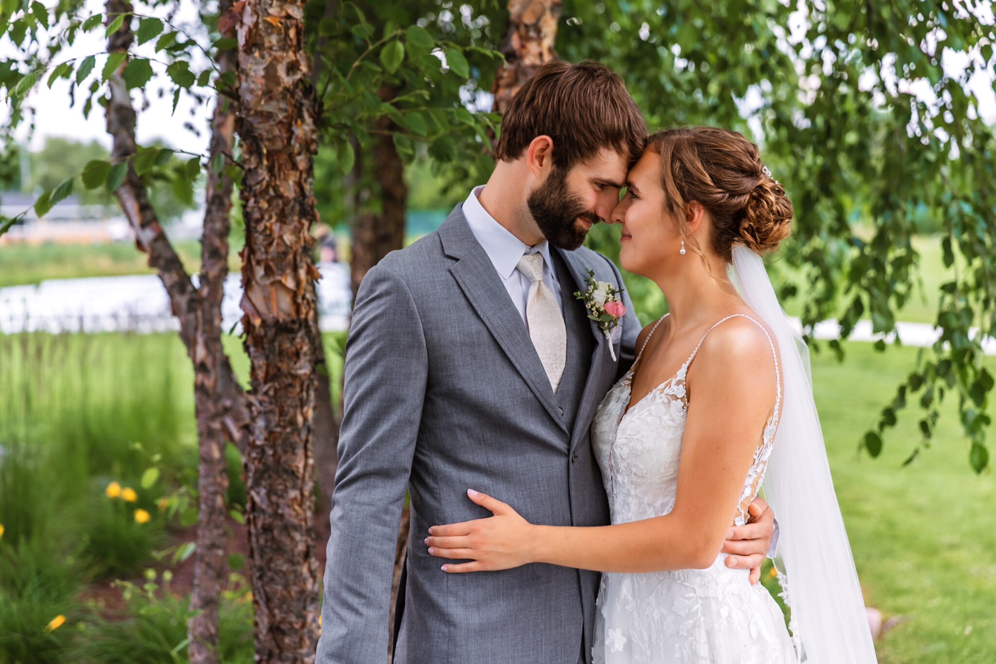 Kelsey & Michael Wedding Photo - Arms wrapped around each other, resting foreheads together and gentle smiles