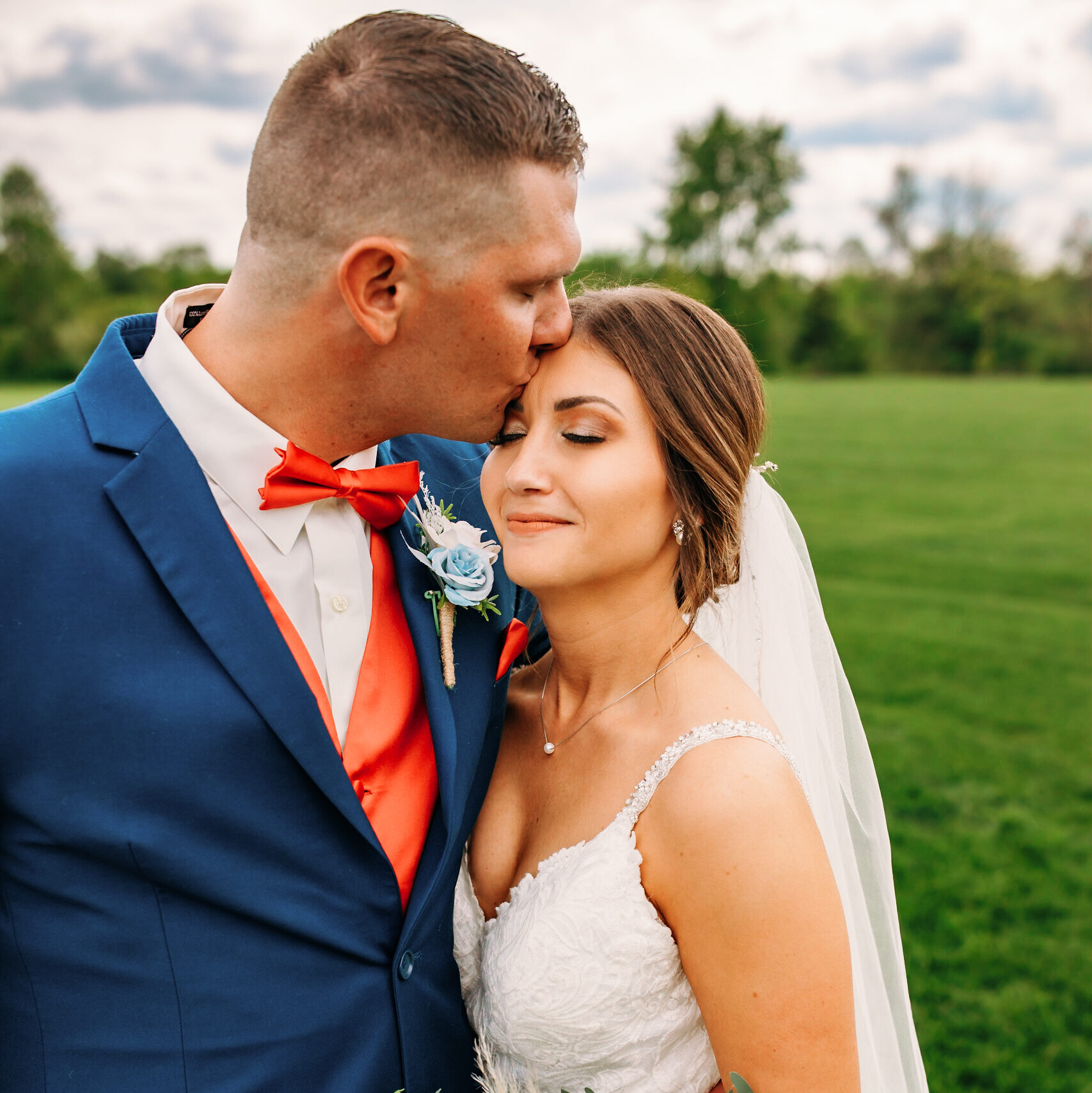 Cassidy & Cody Green Bay Wedding Photo - Kissing on Forehead